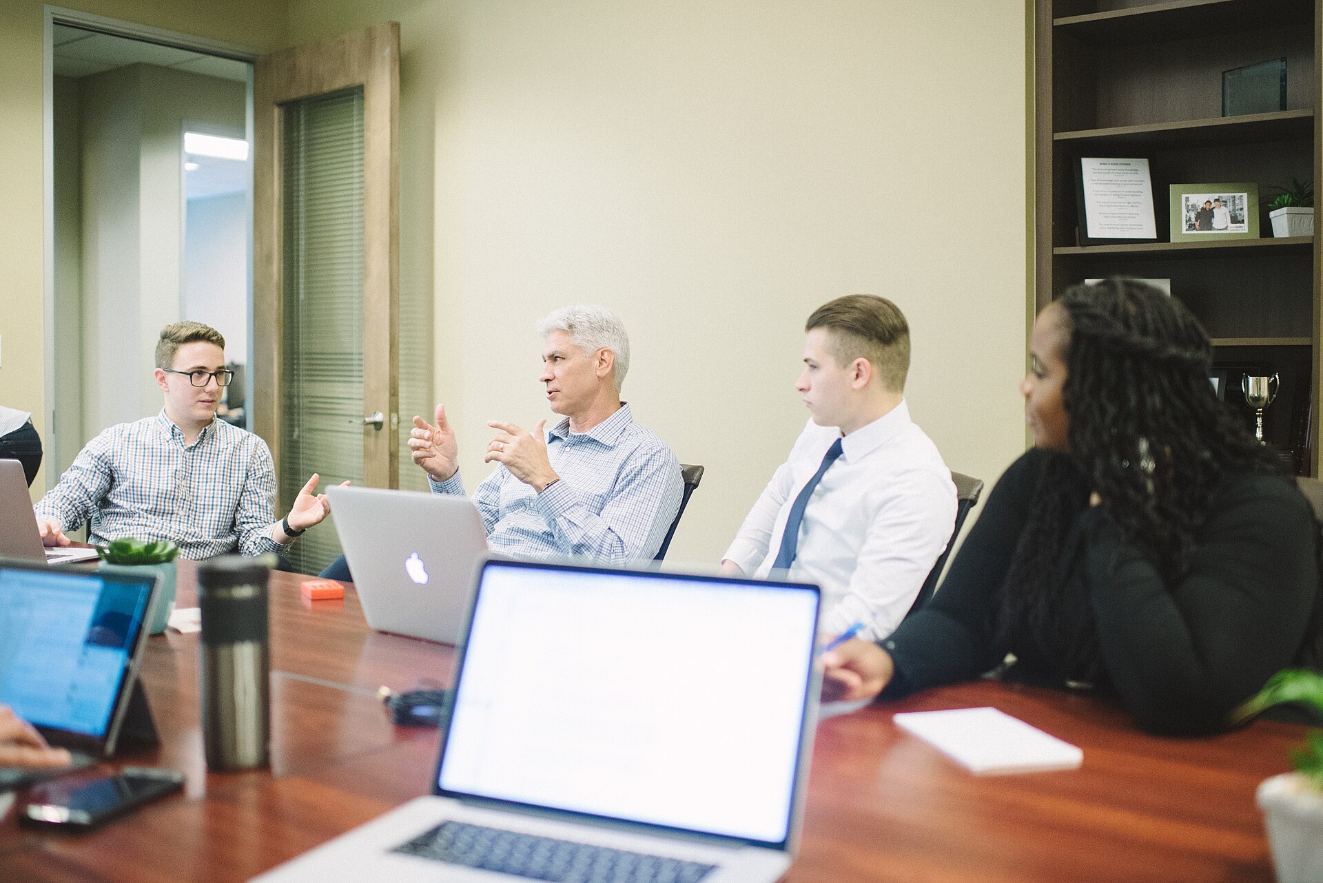 A professional performance management evaluation session with metrics.