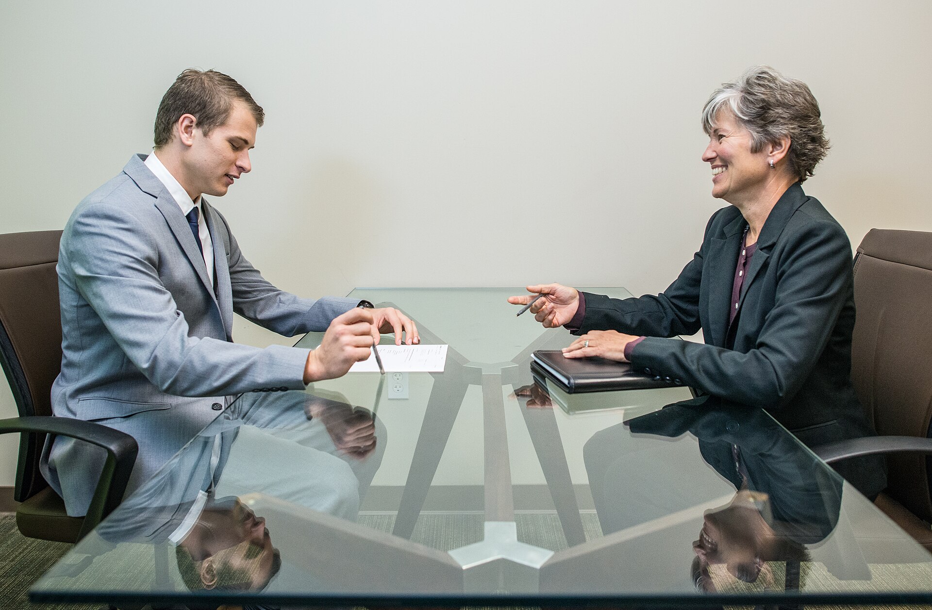 An in-house assessment centre structured candidate evaluation.